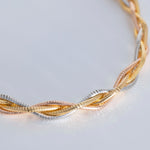 Load image into Gallery viewer, Adonis - Triple Layered Braided Bracelet: Silver, Gold and Rose Gold Polish
