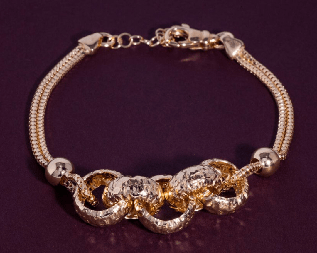 Plutus - Braided Rings Snake Chain Bracelet: Gold Polish