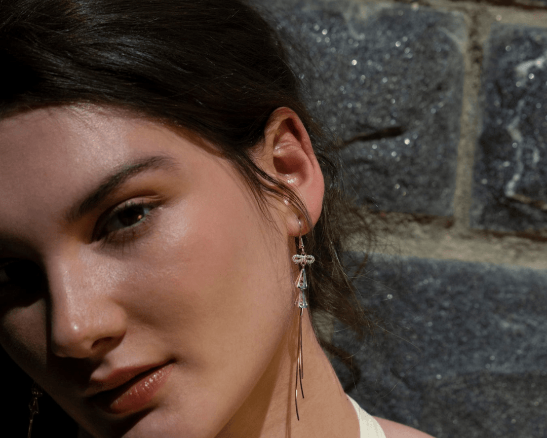 Semele - Silver Zirconia and Bows Tassle Dangler Earrings