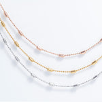 Load image into Gallery viewer, Maeve - Triple Layered Beaded Chain Necklace: Silver, Gold and Rose Gold Polish
